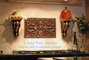 kitchen backsplash ideas with metal plaque and matching corbels