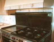 before picture of range backsplash