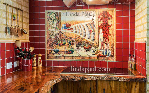 chili pepper mural with red tile wood countertop