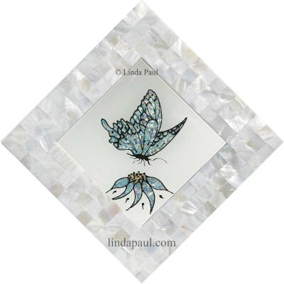 blue butterfly and white mother of pearl mosaic