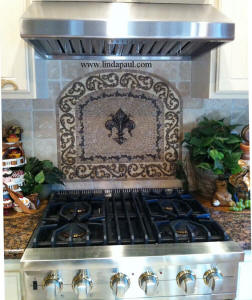 custom kitchen backsplash design with arched fleur de lis